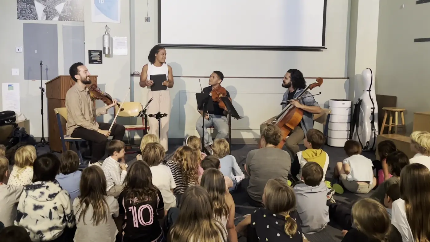 The Ivalas Quartet performing for kids at an outreach event in Telluride